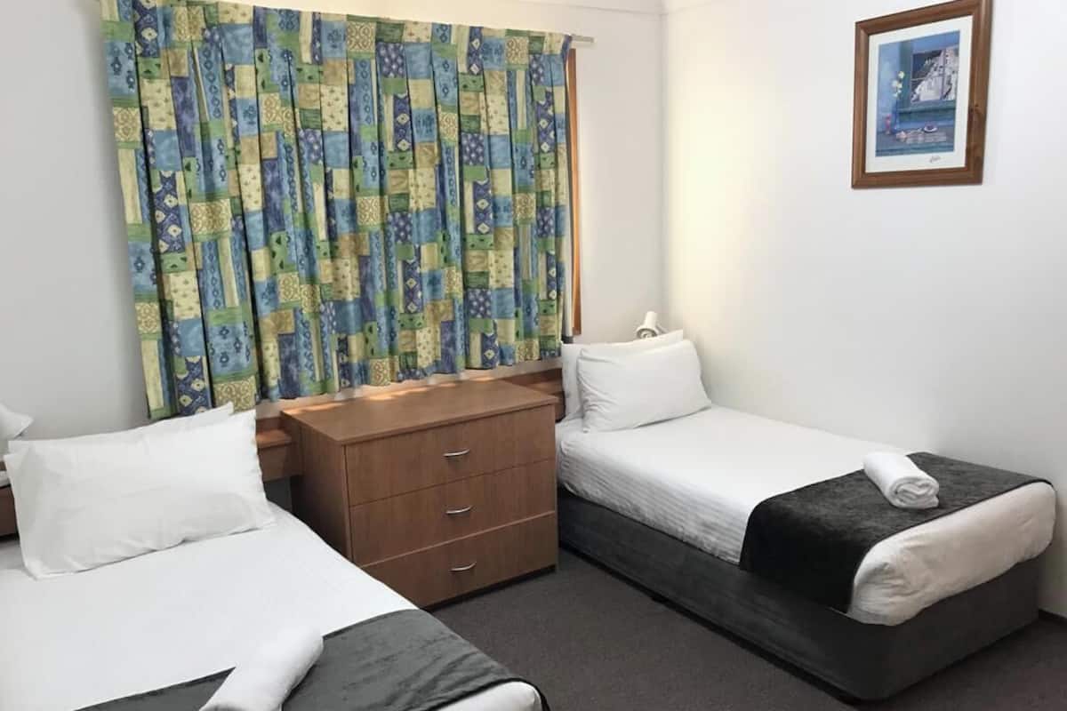 Desk, blackout curtains, soundproofing, iron/ironing board