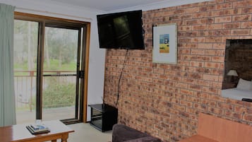 Queen Room with Balcony | Desk, blackout curtains, soundproofing, iron/ironing board
