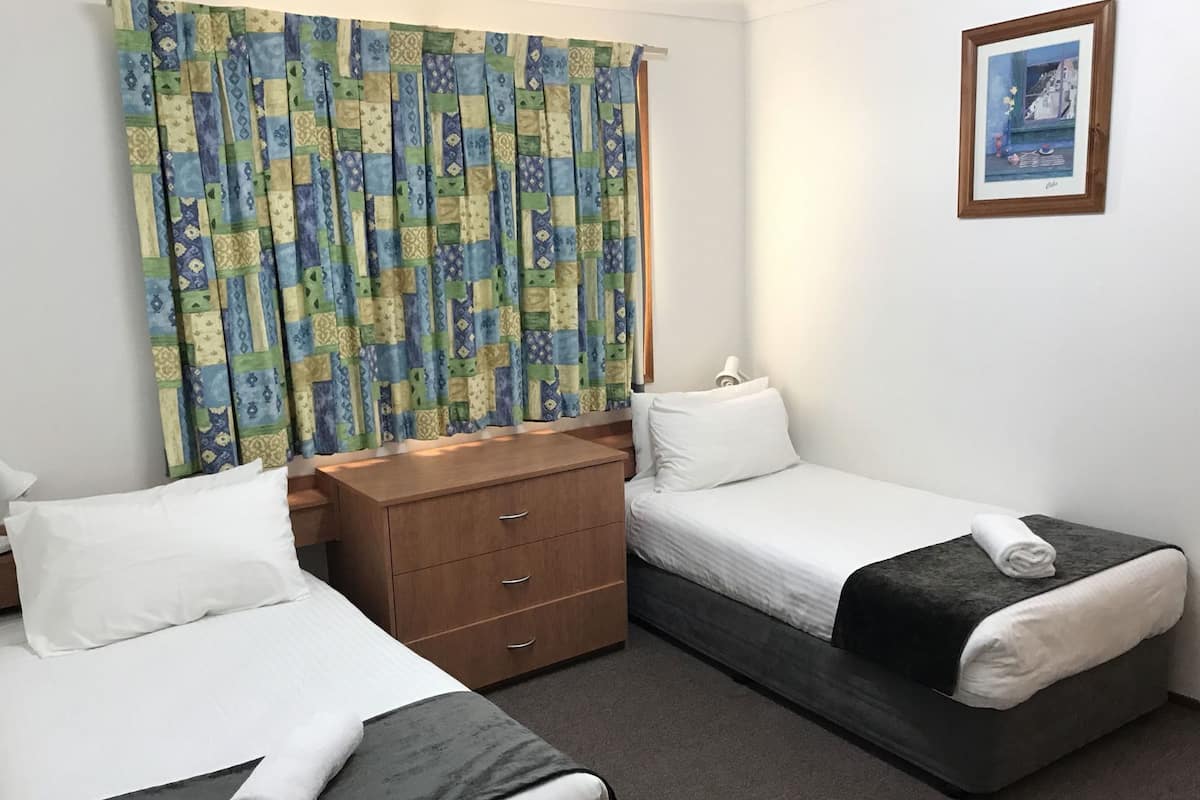 Desk, blackout curtains, soundproofing, iron/ironing board