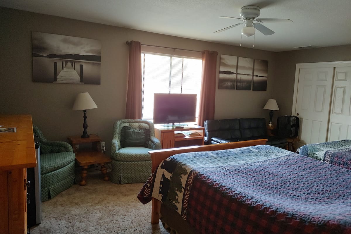3. Family Room | Premium bedding, blackout drapes, iron/ironing board, cribs (free)