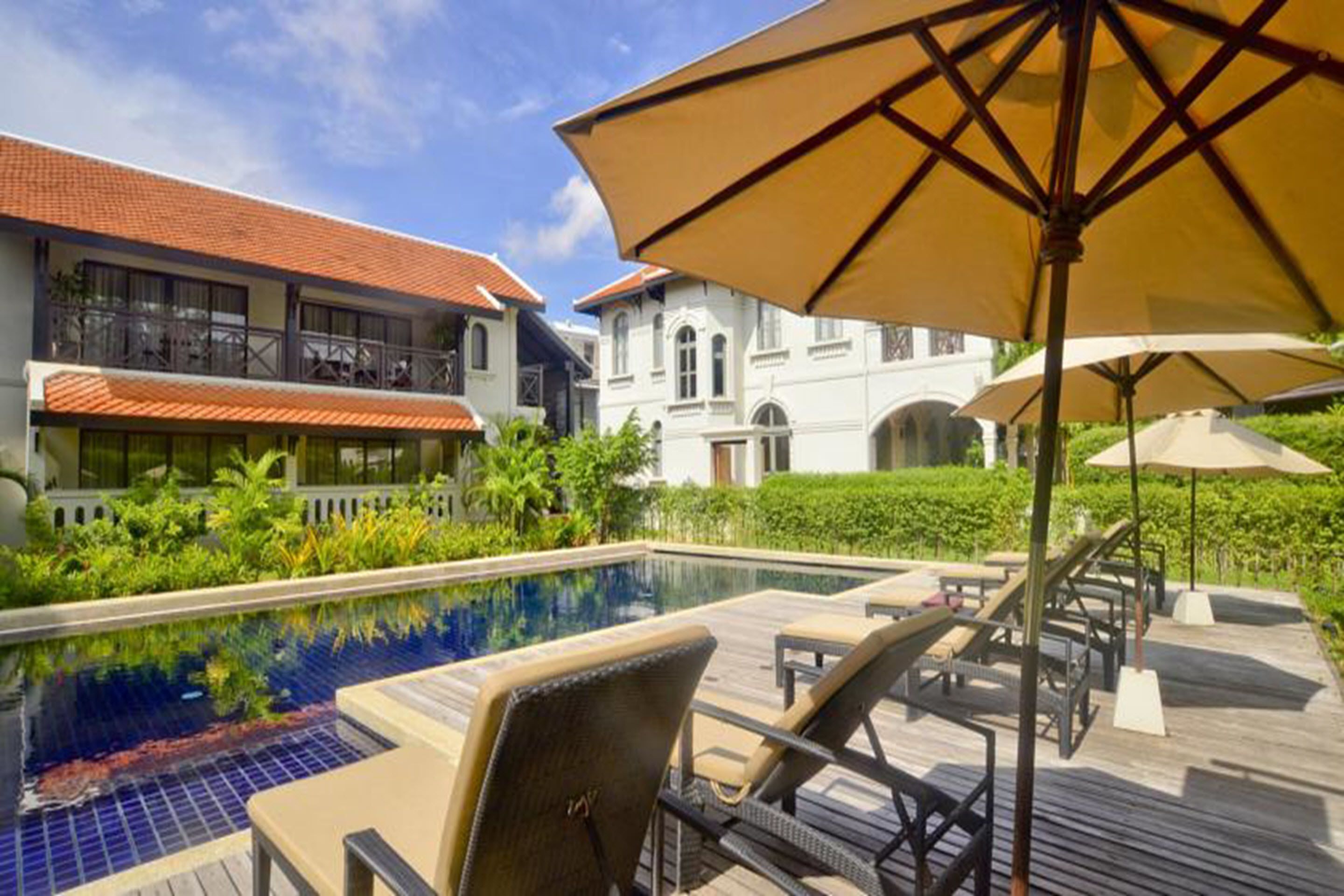 outdoor pool, pool umbrellas, pool loungers