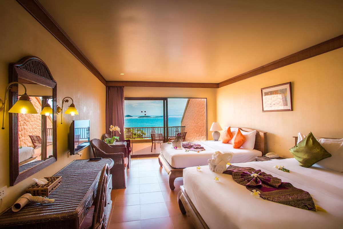 Grand Quadruple Room, 2 Queen Beds, Sea View | Minibar, in-room safe, desk, free WiFi