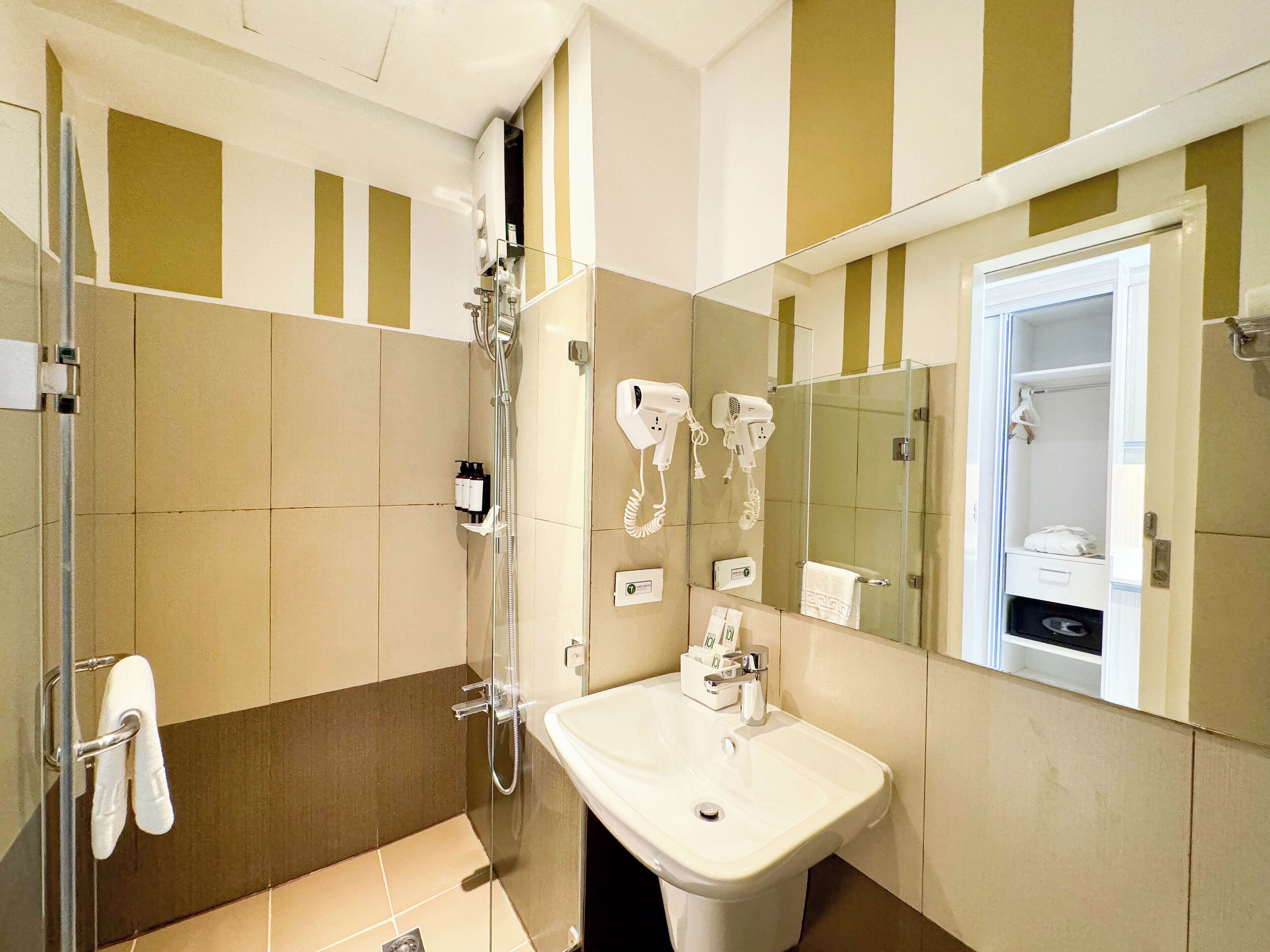 free toiletries, slippers, bidet, towels