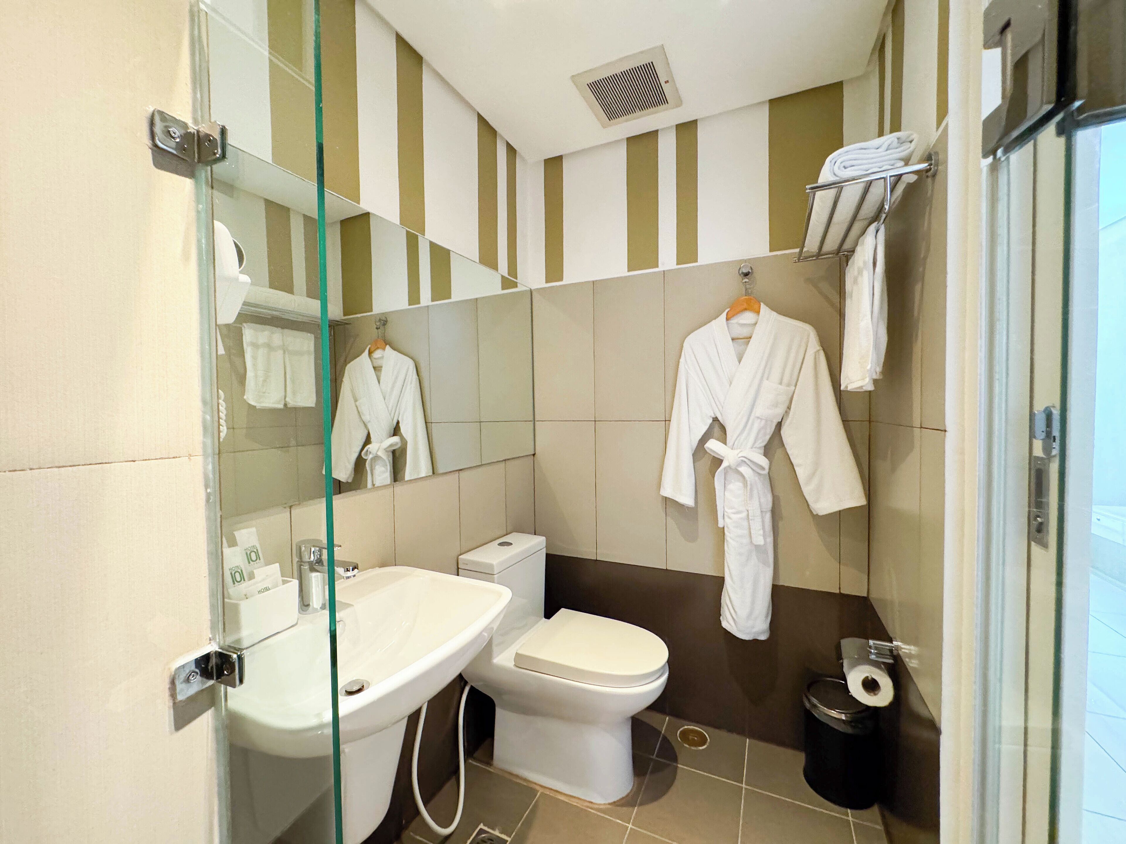 free toiletries, slippers, bidet, towels