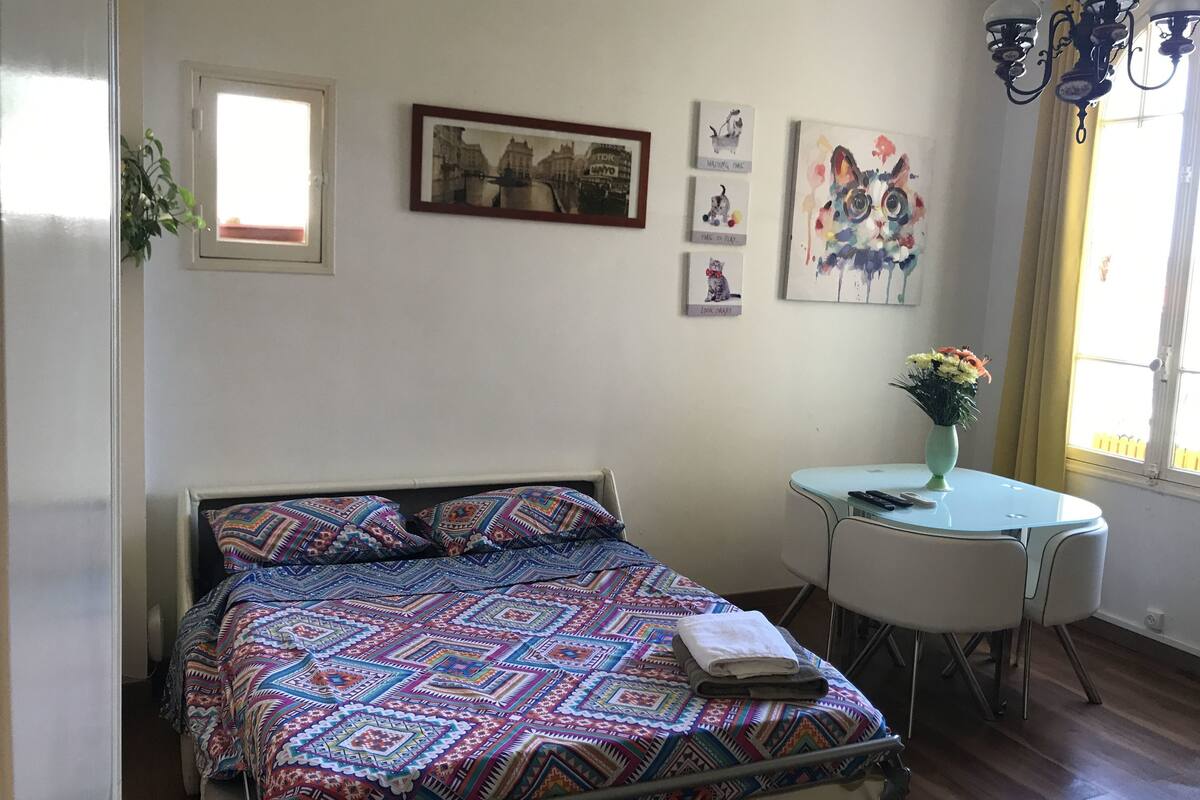 Ropa de cama de alta calidad y tabla de planchar con plancha 