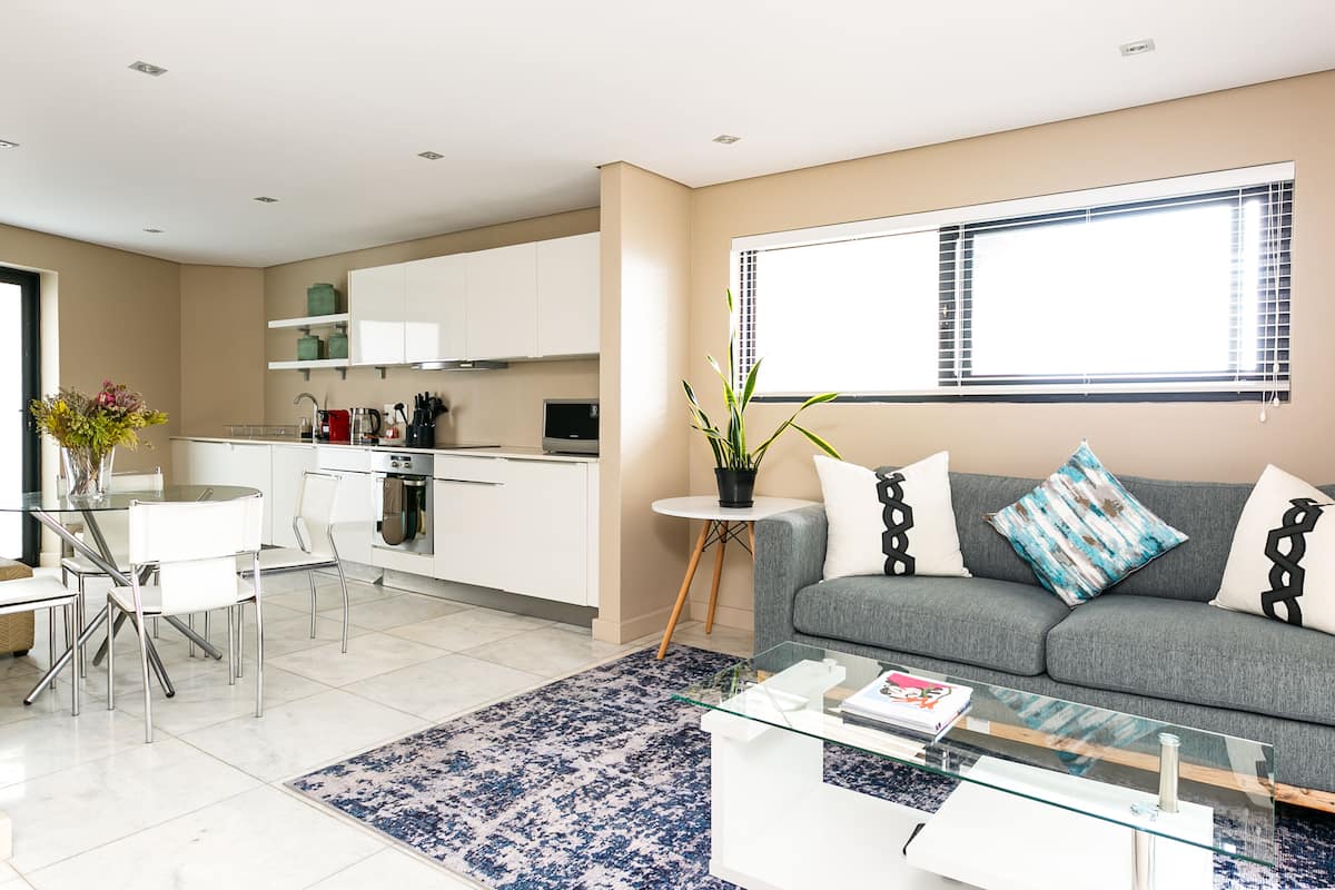 Basic Apartment | Living area | 43-inch flat-screen TV with digital channels