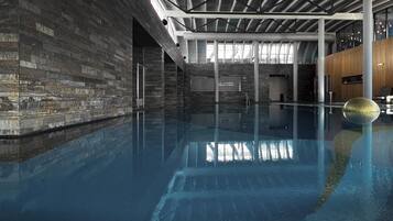 Indoor pool, outdoor pool, pool umbrellas, pool loungers