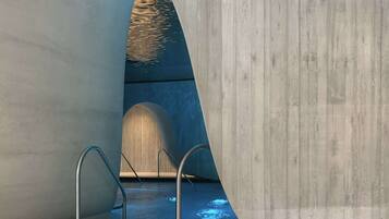 Indoor pool, outdoor pool, pool umbrellas, sun loungers