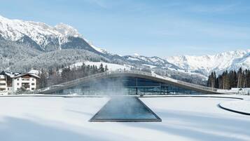 Indoor pool, outdoor pool, pool umbrellas, pool loungers