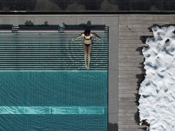 Indoor pool, outdoor pool, pool umbrellas, sun loungers