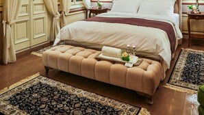 A luxurious bedroom with a large bed, ornate ceiling, and classic decor. - 1905 Boutique Hotel (Xanthi)