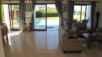 Villa, 2 Bedrooms, Sea View | Living area | 32-inch flat-screen TV with satellite channels, TV, DVD player