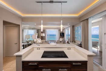 Fridge, microwave, stovetop, electric kettle at Conrad Fort Lauderdale Beach