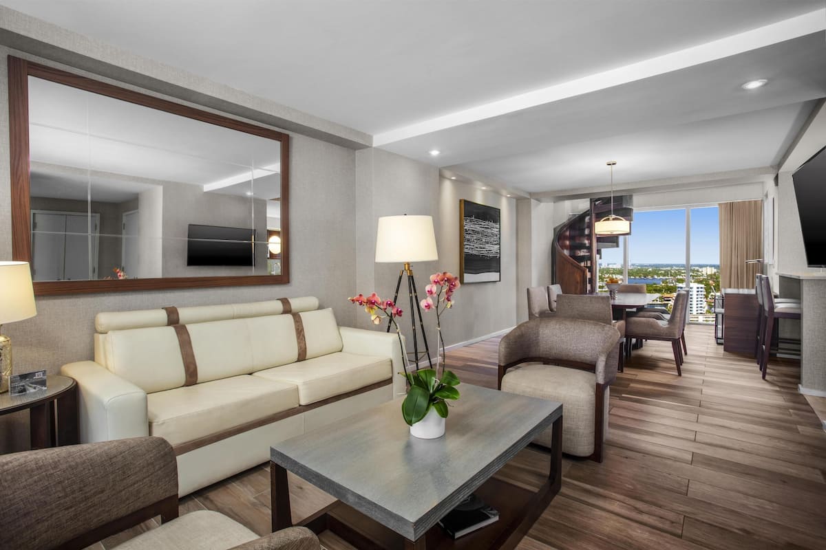 Duplex, 1 Bedroom, Poolside | Living area | 50-inch flat-screen TV with cable channels, TV, pay movies