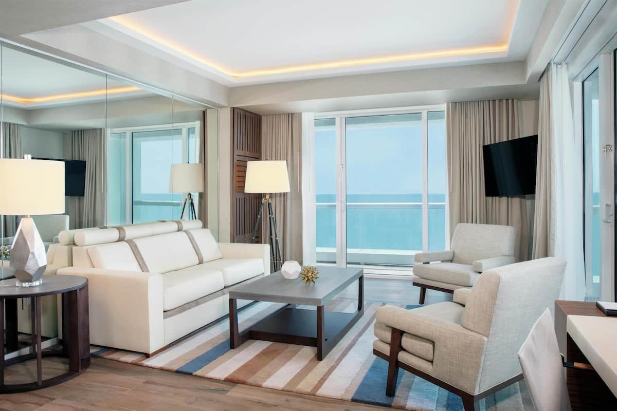 Suite, 2 Bedrooms, Oceanfront (Residence) | Living area | 50-inch flat-screen TV with cable channels, TV, pay movies