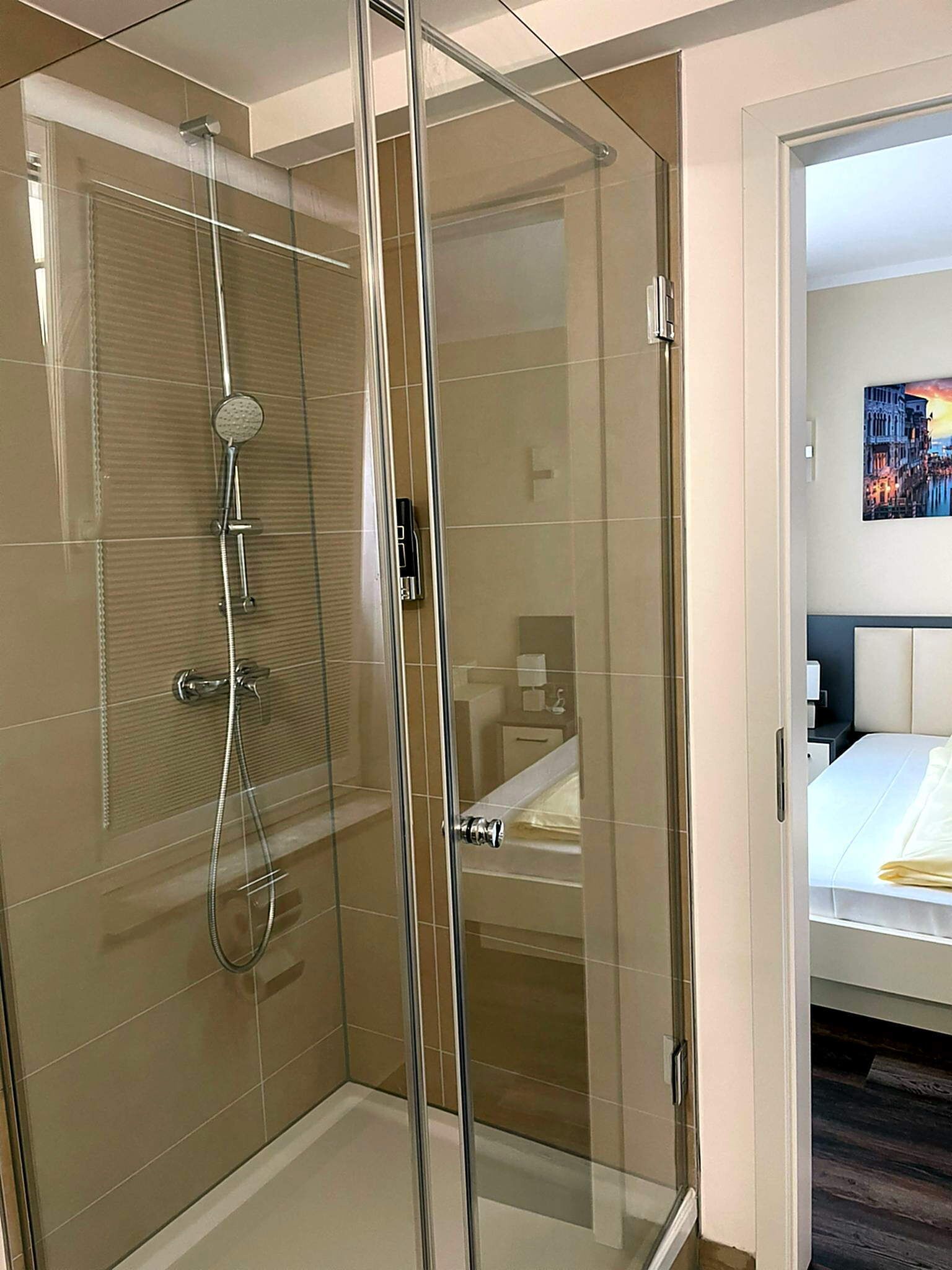 superior single room | bathroom | shower, free toiletries, hair dryer, towels