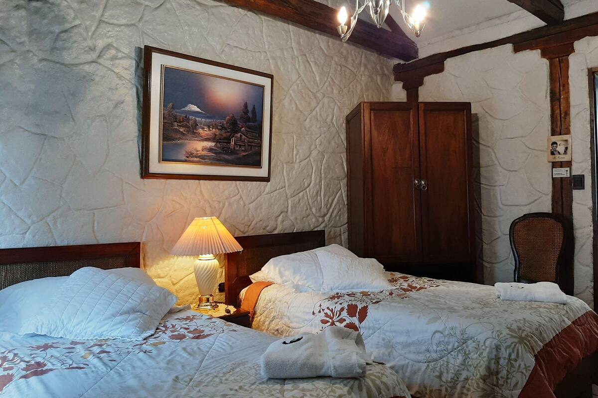 Premium bedding, desk, laptop workspace, soundproofing