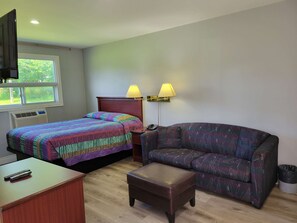 Suíte, 1 cama Queen e sofá-cama, para não fumantes, cozinha | Escrivaninha, Wi-Fi de cortesia, roupa de cama