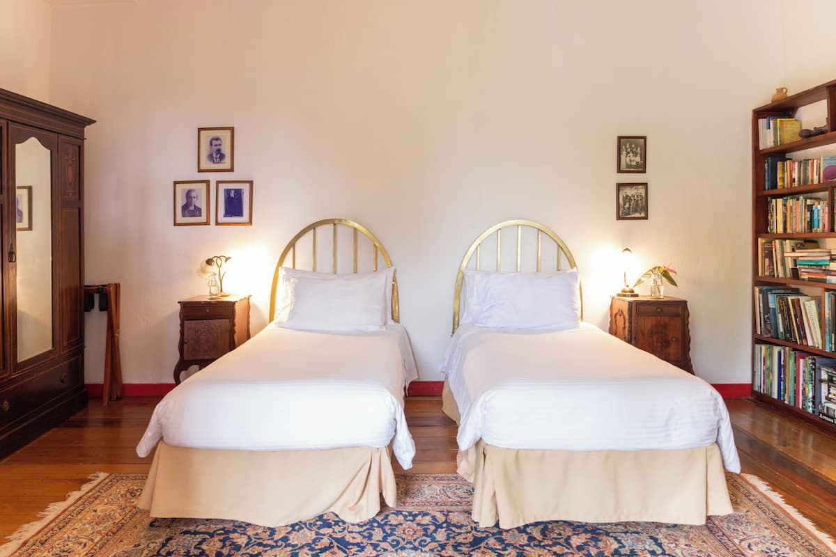 Junior Double Room, 1 Bedroom, Private Bathroom | In-room safe, individually decorated, individually furnished, bed sheets