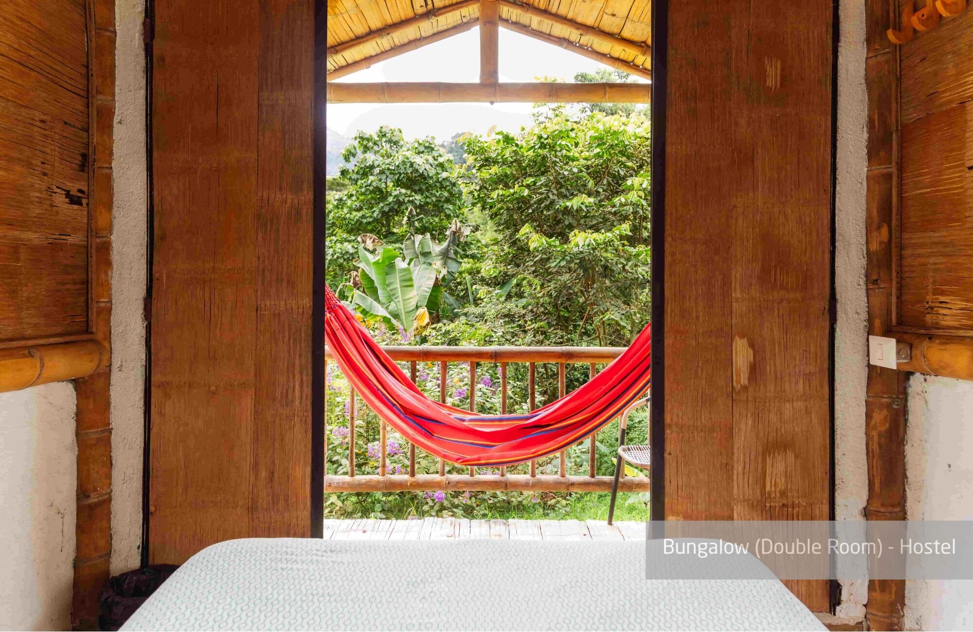 Habitación doble tradicional, baño compartido, vista al jardín | Ropa de cama de alta calidad y caja de seguridad en la habitación 