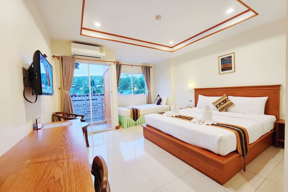 comfort family room | premium bedding, in-room safe, individually furnished, desk