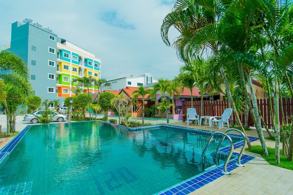 Outdoor pool, open 7:00 AM to 10 PM, free pool cabanas, pool umbrellas