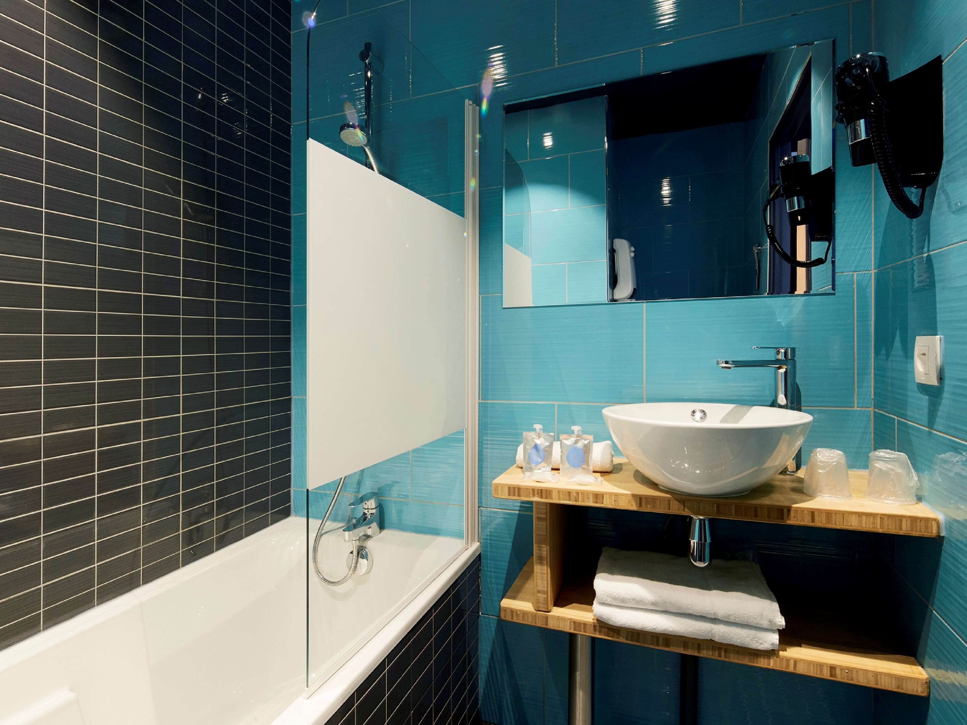 standard room, 1 double bed | bathroom | eco-friendly toiletries, hair dryer, towels