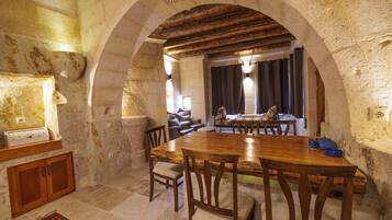 Superior Suite | Living area | 32-inch Smart TV with satellite channels, TV