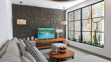 Deluxe Villa, 1 Bedroom, Private Pool | Living area | 32-inch flat-screen TV with satellite channels, TV, DVD player