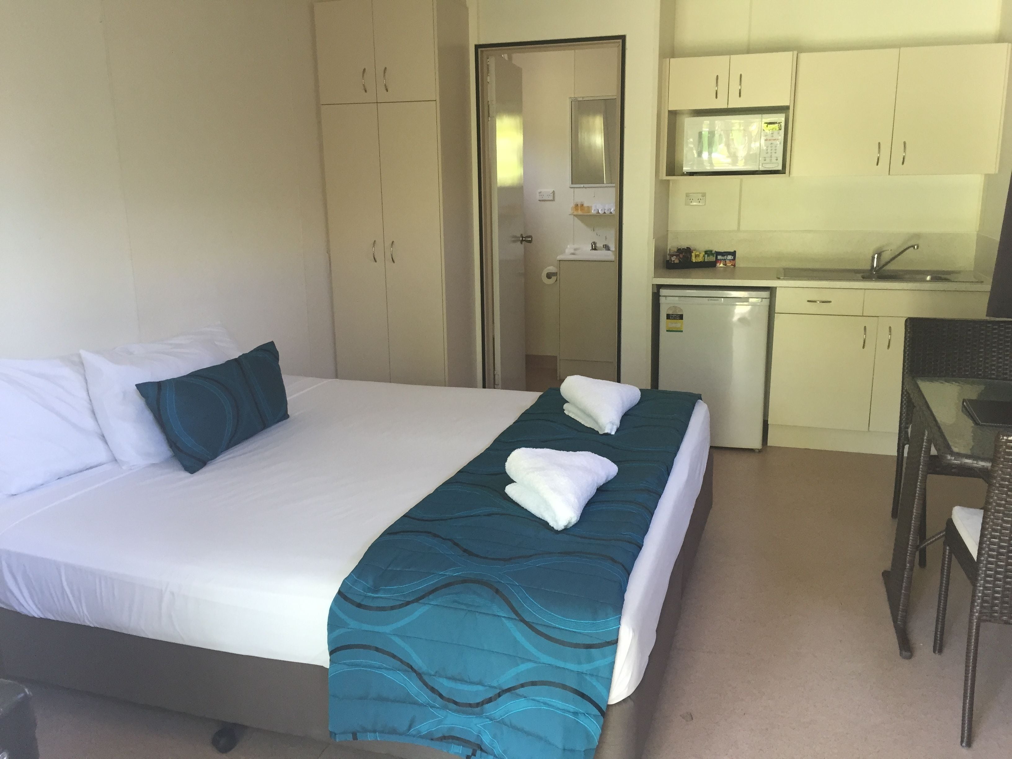 studio king | premium bedding, iron/ironing board, bed sheets