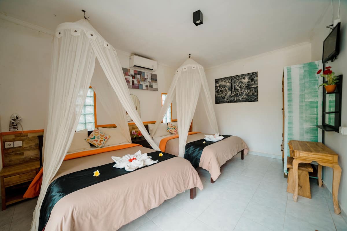 Family Room, Pool View | In-room safe, desk, cribs (surcharge), rollaway beds (surcharge)