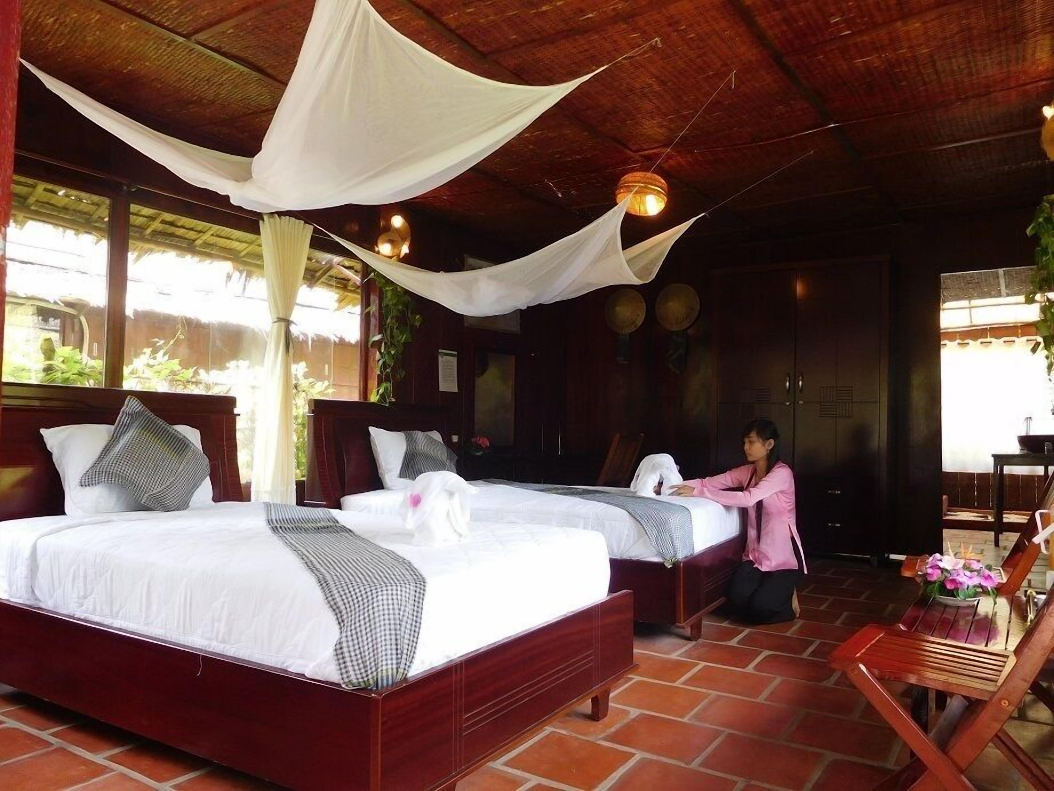 triple room, garden view | minibar, desk, free wifi, bed sheets