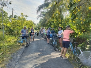 Quadruple Room, Garden View | Minibar, desk, free WiFi, bed sheets