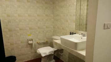 Shower, free toiletries, slippers, towels