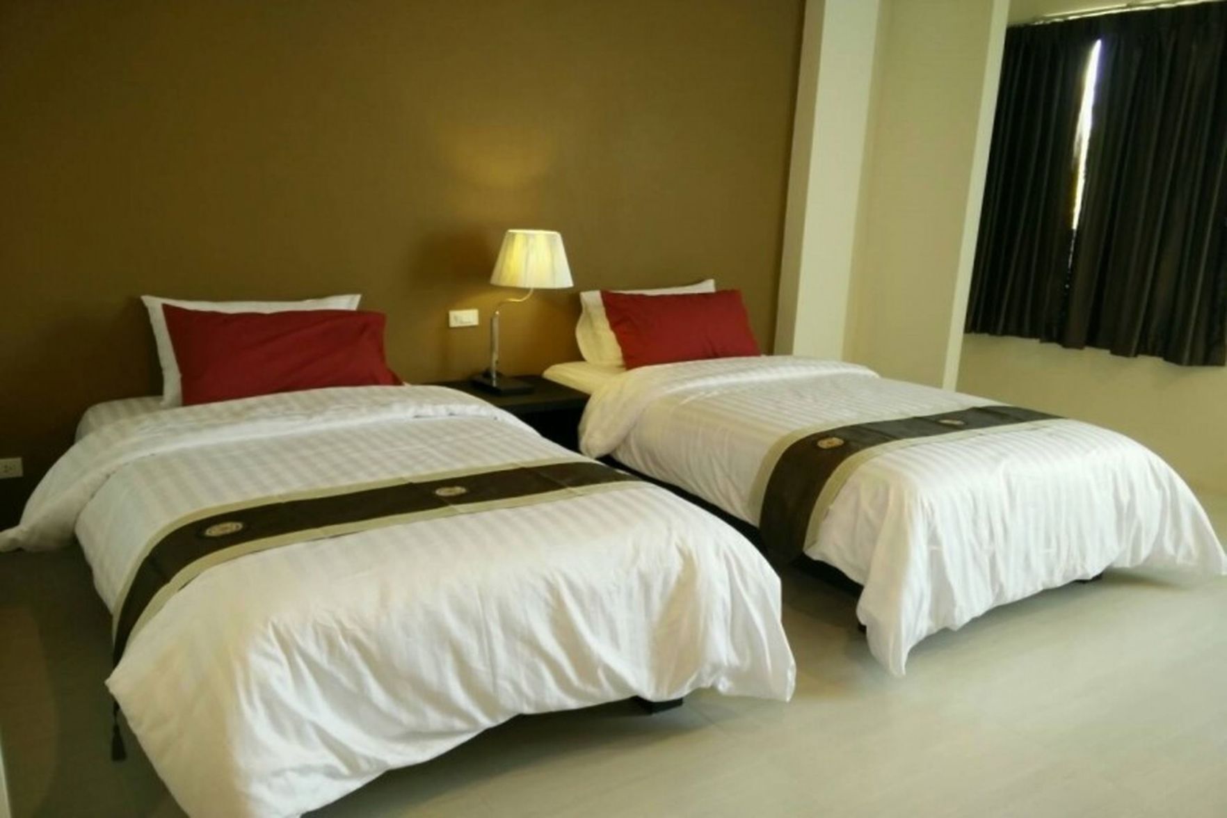 Hypo-allergenic bedding, desk, blackout curtains, rollaway beds