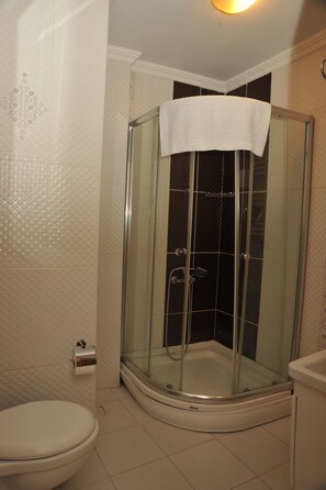 Shower, free toiletries, hair dryer, towels