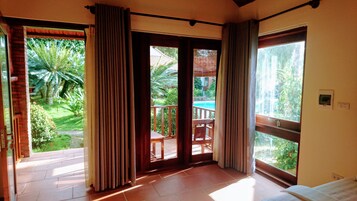 Family Room, Pool View | Pillowtop beds, minibar, WiFi (free), bed sheets