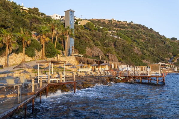 Private beach, sun-loungers, beach umbrellas
