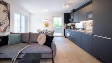 Family Apartment, 2 Bedrooms, Non Smoking, Balcony | Living area | 42-inch flat-screen TV with cable channels, TV, table tennis