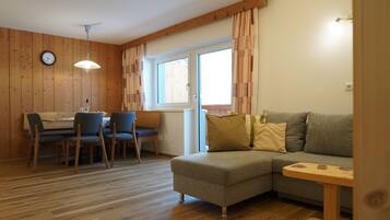 Panoramic Apartment, 1 Bedroom, Kitchen, Mountain View (Balcony) | Living area | 43-inch flat-screen TV with satellite channels, TV, toys