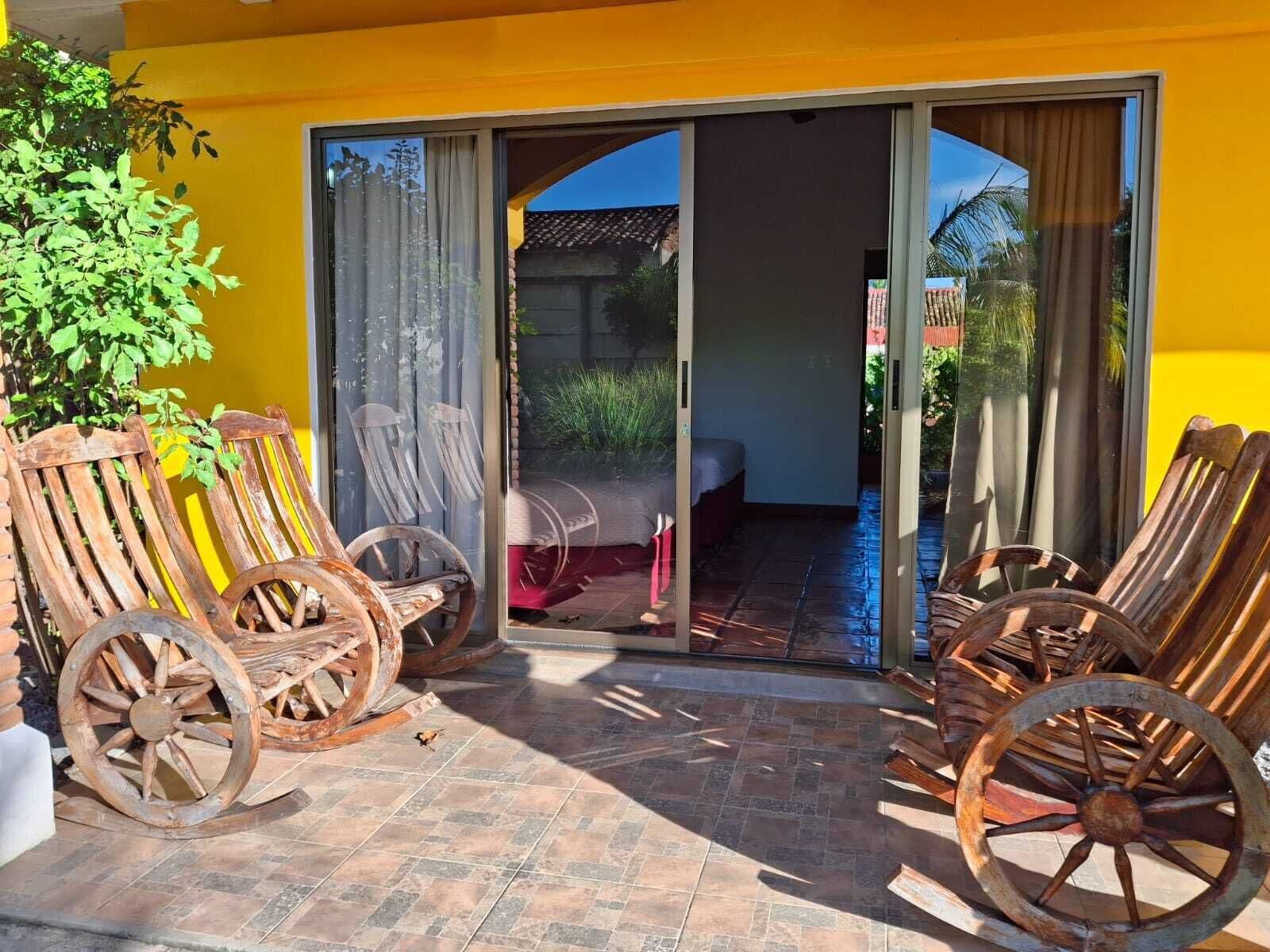 deluxe quadruple room, 1 bedroom, pool view | 1 bedroom, minibar, in-room safe, desk