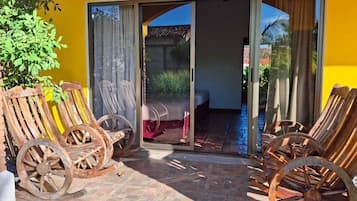 Deluxe Quadruple Room, 1 Bedroom, Pool View | Minibar, in-room safe, desk, blackout drapes