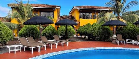 Outdoor pool, open 8:00 AM to 9:00 PM, pool umbrellas, sun loungers