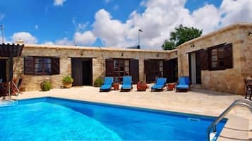 Outdoor pool, pool umbrellas, pool loungers