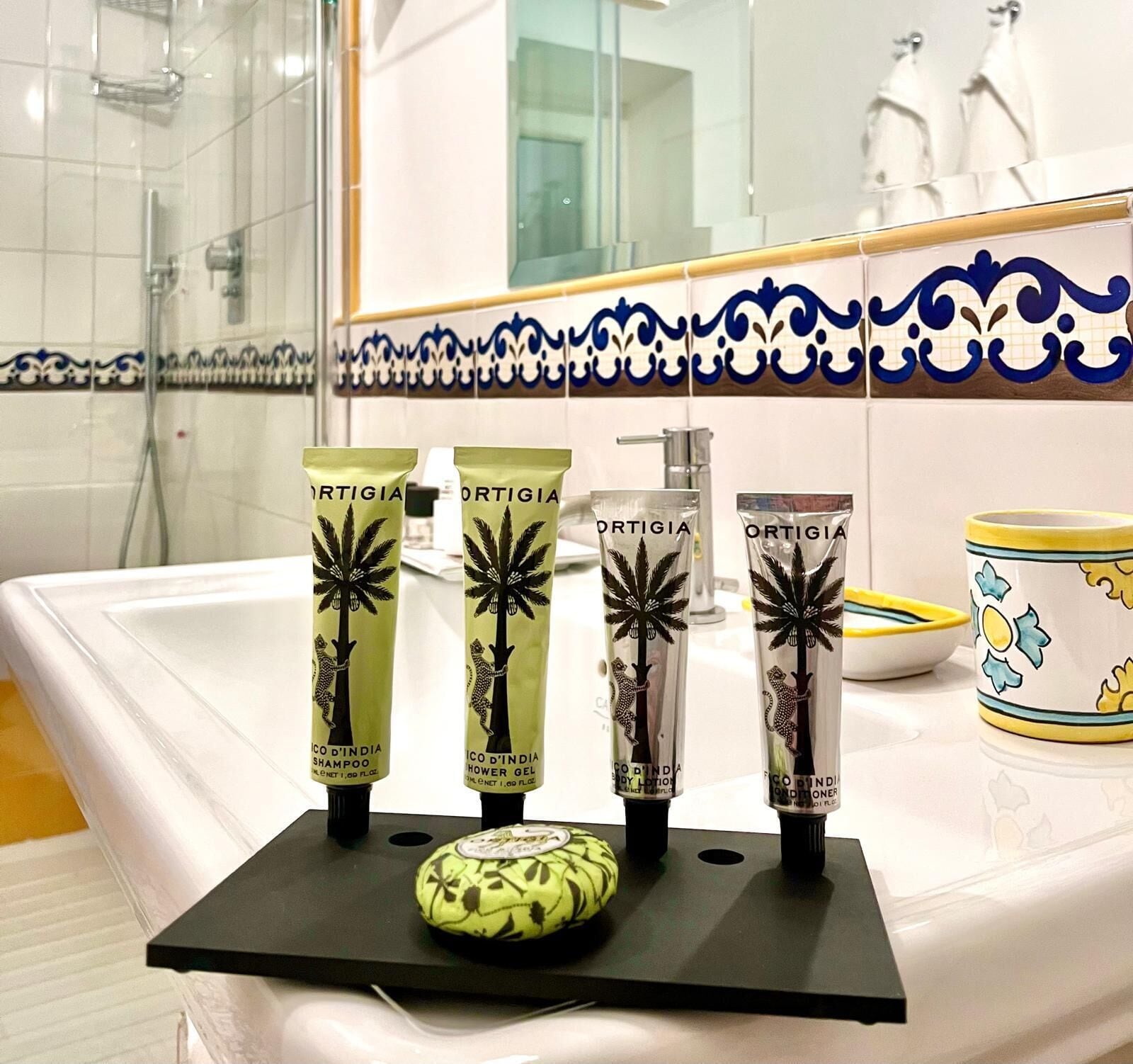 shower, rainfall showerhead, designer toiletries, hair dryer