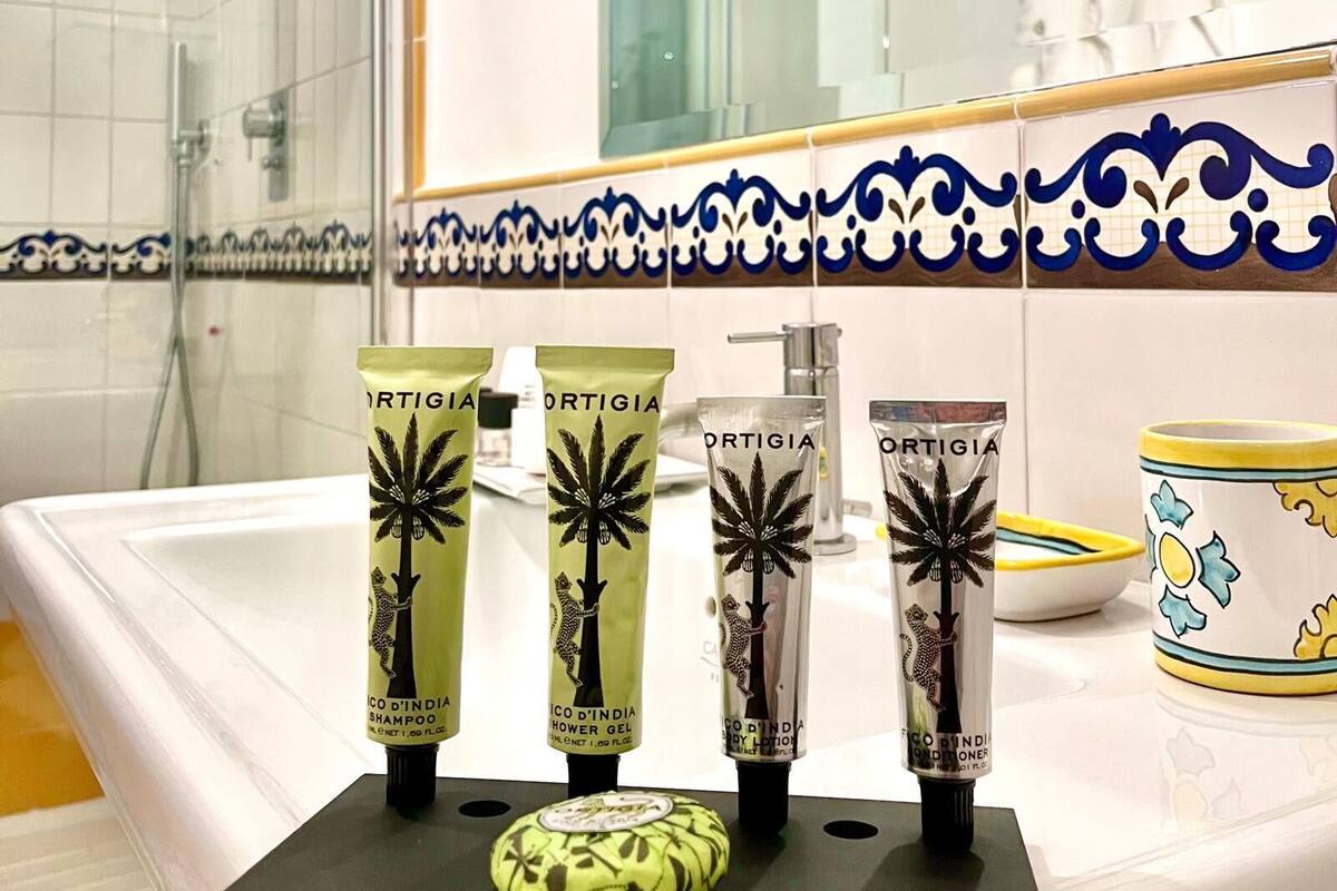 shower, rainfall showerhead, designer toiletries, hair dryer