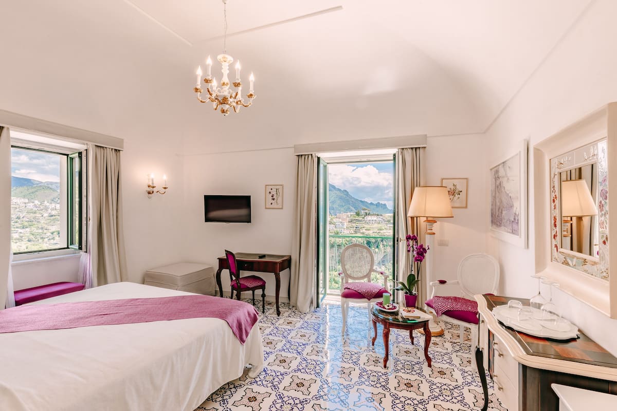 Grand suite, uitzicht op zee (Rosa Canina) | 1 slaapkamer, Italiaanse Frette-lakens, luxe beddengoed, donsdekens