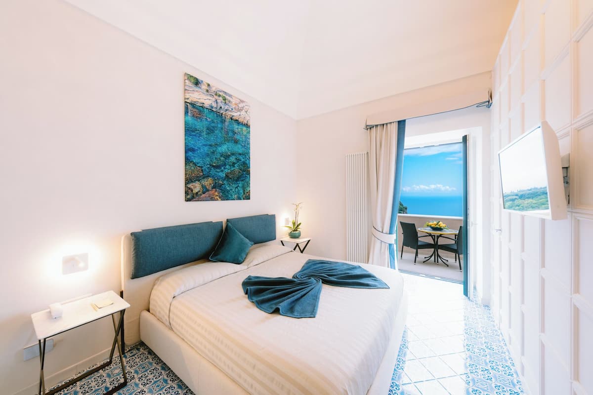 Junior suite | 1 slaapkamer, Italiaanse Frette-lakens, luxe beddengoed, donsdekens
