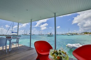 Premium Villa, 2 Bedrooms, Kitchen, Lagoon View | Terrace/patio - Aqua Lodge (Saint-François)