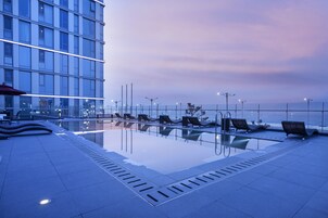 Seasonal outdoor pool, open 3:00 PM to 9:00 PM, sun loungers